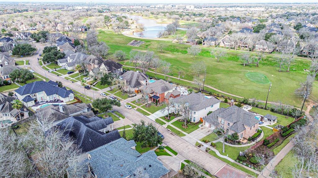 ENJOY BREATHTAKING GOLF COURSE VIEWS RIGHT FROM YOUR BACKYARD, WITH DIRECT ACCESS TO LUSH FAIRWAYS AND PEACEFUL GREEN SPACES.