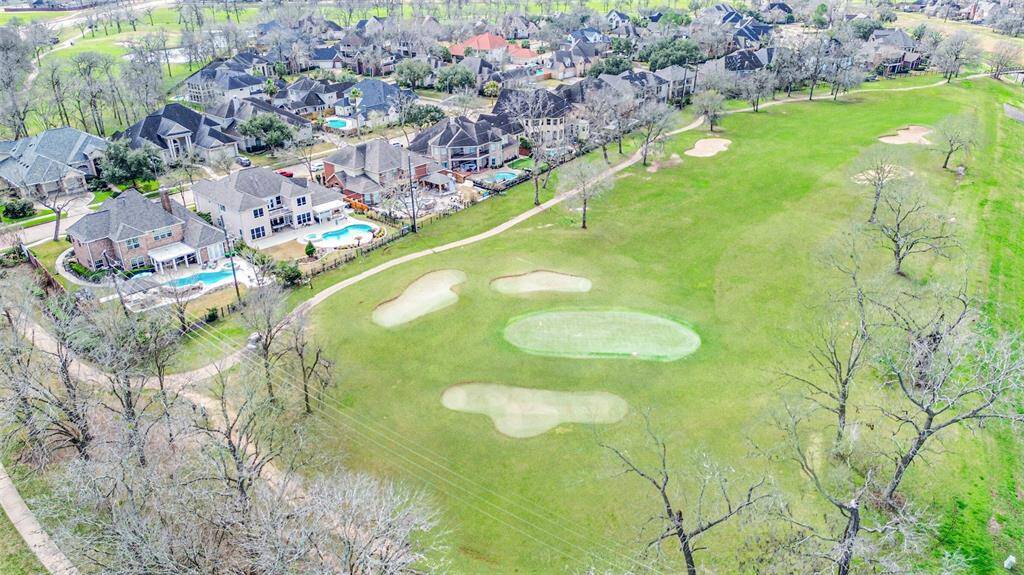 OVERLOOKING THE LUSH GREENERY OF THE GOLF COURSE, THIS HOME IS NESTLED IN DESIRABLE GREATWOOD WITH SCENIC VIEWS AND EASY ACCESS TO OUTDOOR RECREATION.