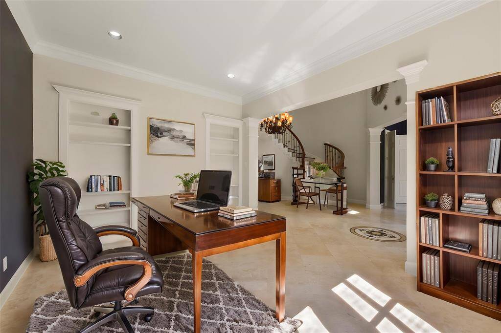 PERFECT HOME OFFICE SPACE WITH CUSTOM BUILT-INS AND A TILE FLOORING. **This room has been virtually staged.