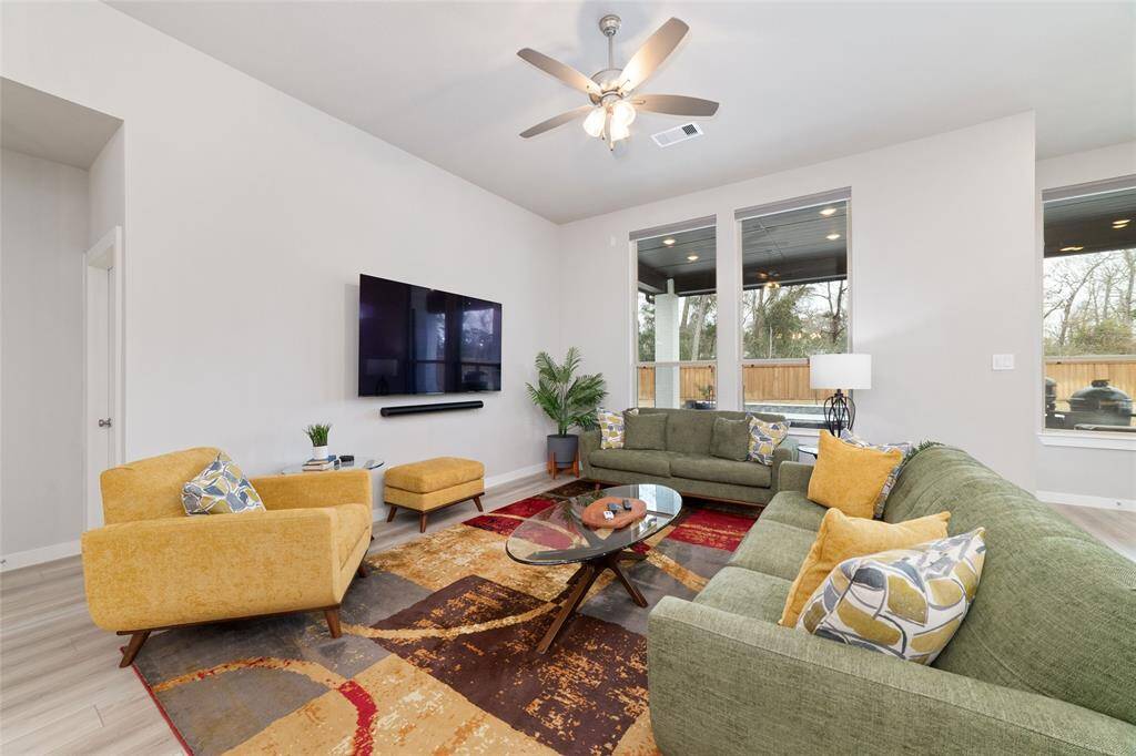 Beautiful views of the outdoors, kitchen and dining room as well as a great place to unwind and watch a movie. Another bonus is the TV stays.  (*Soundbar shown is excluded.)