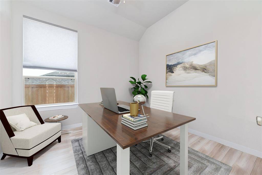 Double doors lead you to the office/study off the dining room.  Virtually staged as it is currently being used as a sitting room.
