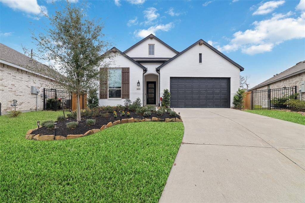 Beautiful curb appeal welcomes you as you approach the home.