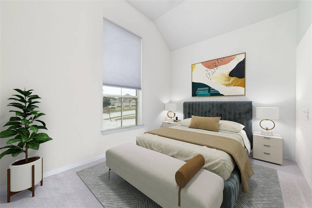Secondary bedroom at the front of the home. Virtually staged as it is currently being used as an office.