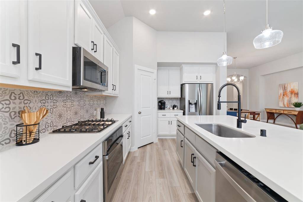 A Highland Home loaded with gorgeous finishes and great storage.
