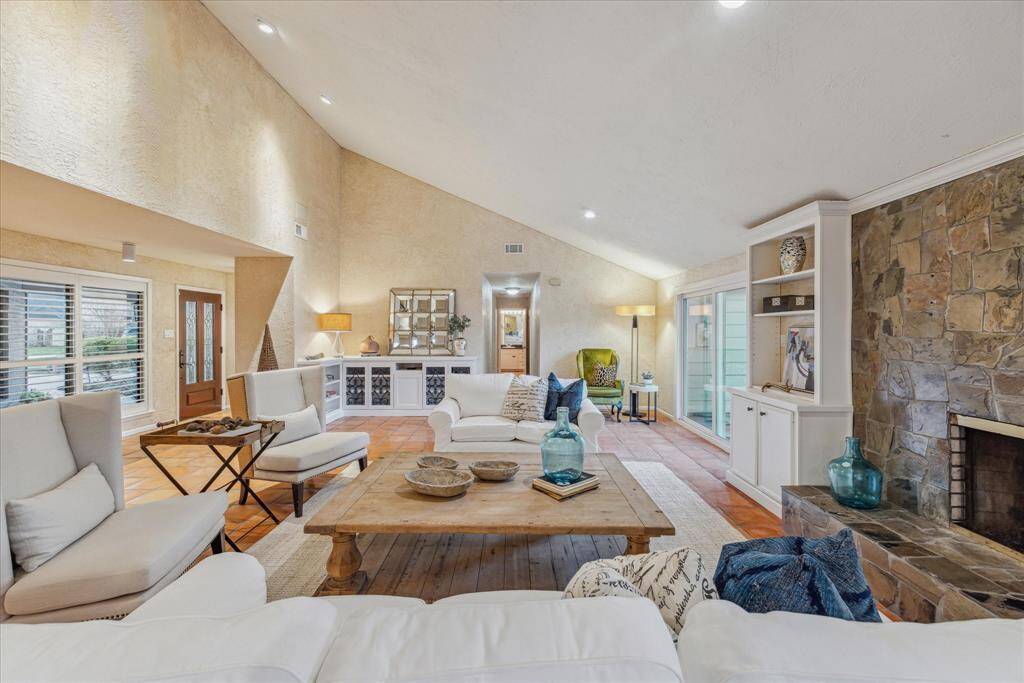Large gathering room with expansive high vaulted ceilings for plenty of natural light.