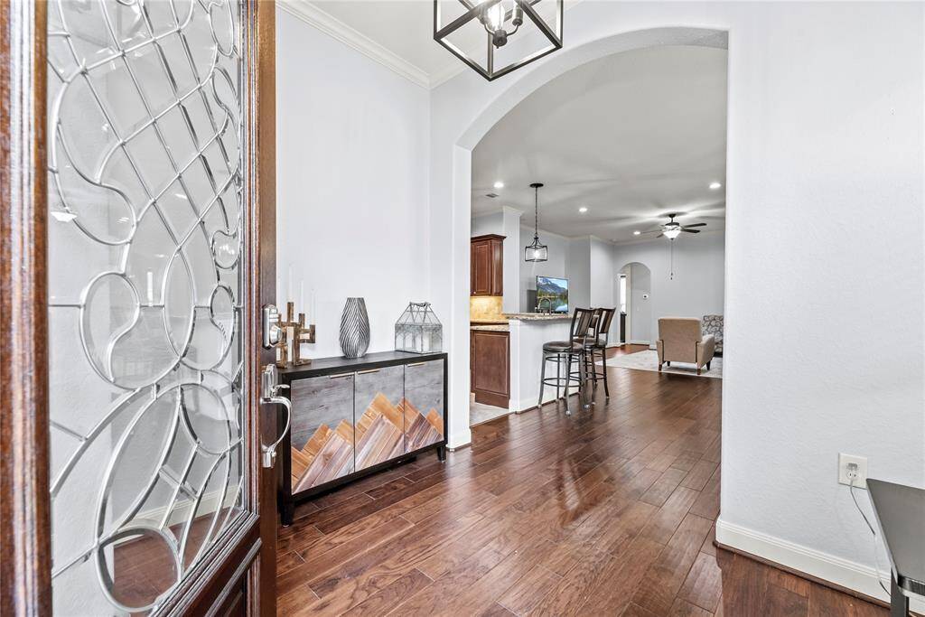 It will be love at first sight. From the front door to the back, this home offers elegant features and soft neutral finishes that invite you to come in, relax, and stay a while. You are home now.