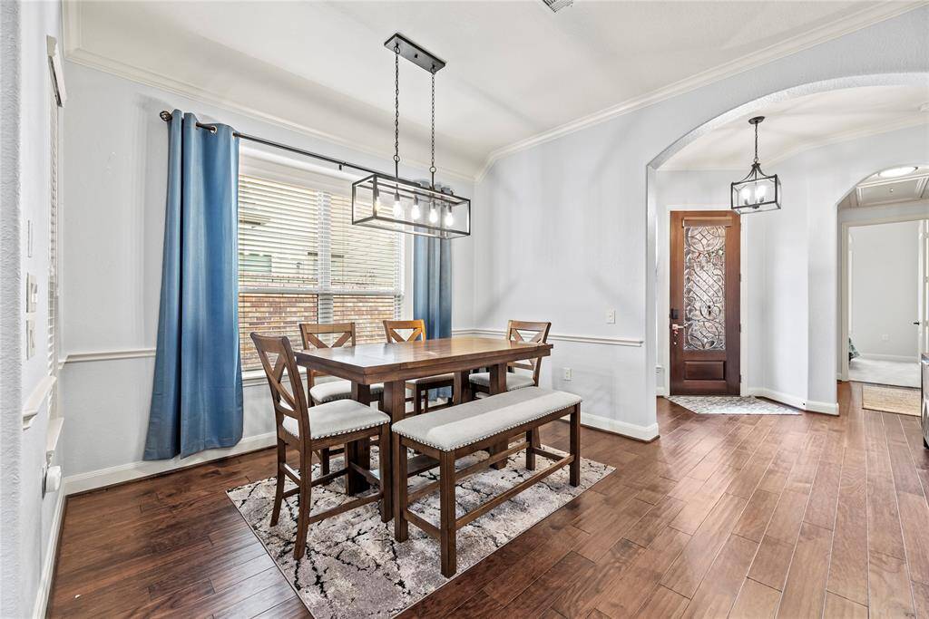 Gather them around your table to honor old traditions and create the new. This elegant formal dining room offers the perfect setting to celebrate every occasion, whether it's a formal dinner party or a casual pizza night.