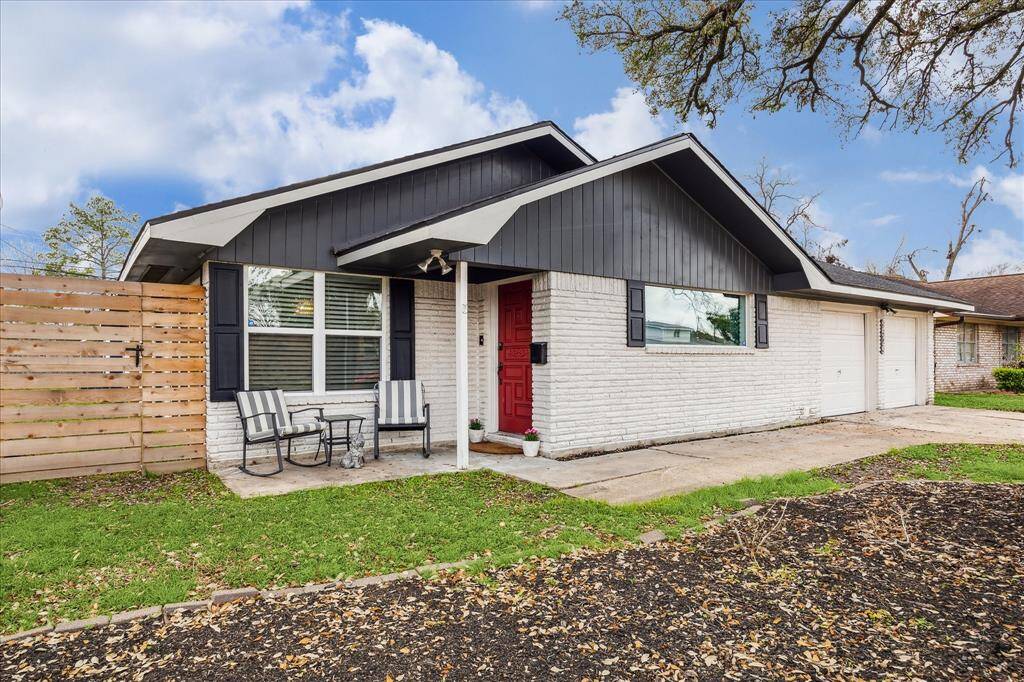9529 Kerrwood Lane is beautiful from the curb and throughout. A charming front porch with red door welcomes you in to this fine home.