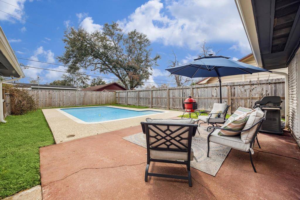 Relax and enjoy a private oasis in your own backyard.  An expansive patio has plenty of space for barbeque grills, and lounge chairs.