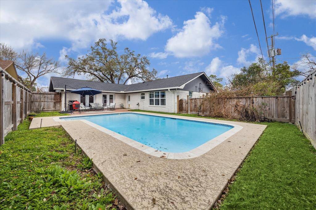 The refreshing pool is great for swimming, floating, or playing.  A large shed (not pictured here) is hidden behind the fence and is a great place for pool toys and garden tools.
