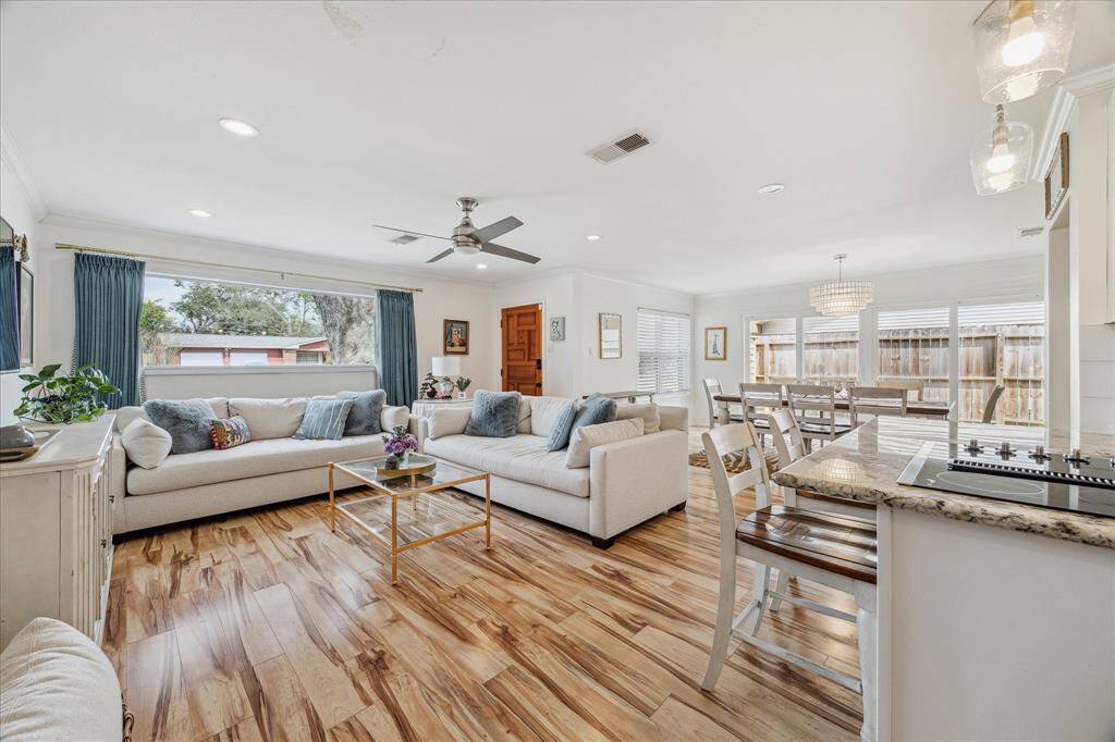 The entire home is light and bright with large windows and neutral paint.