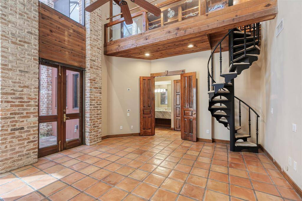 with a circular staircase to the study