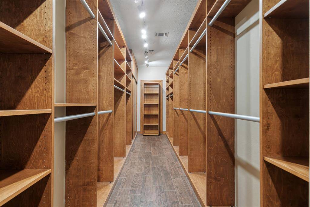 huge master closet with all kinds of built-ins
