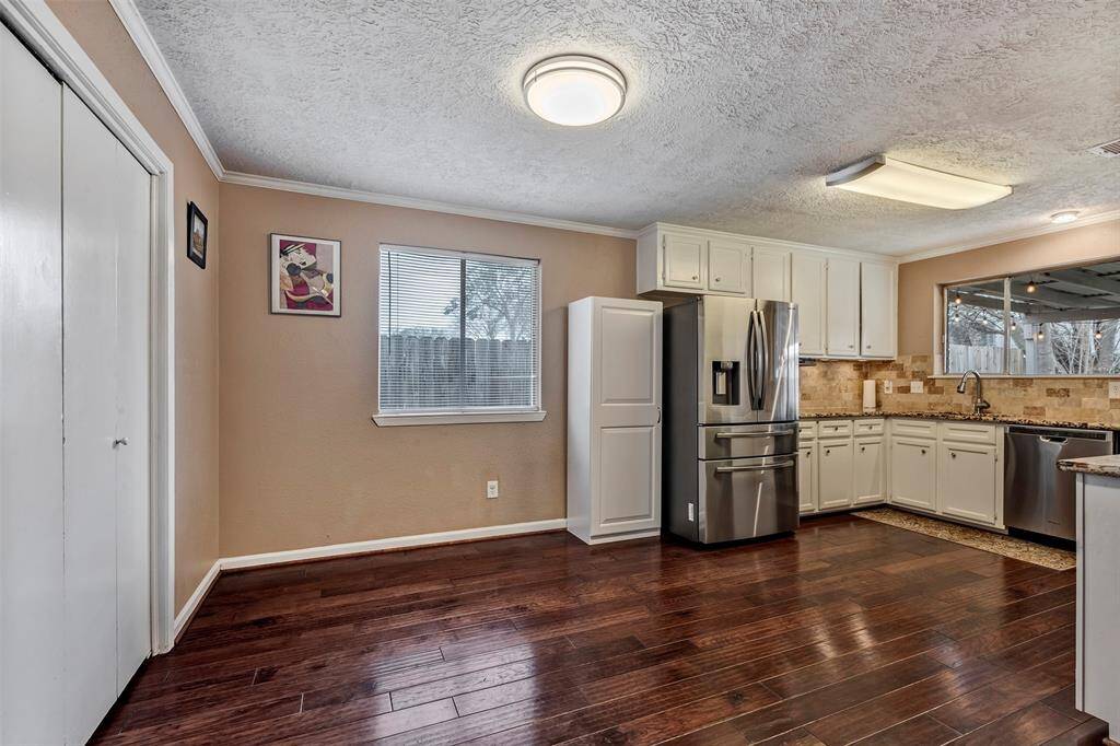 A spacious dining area perfect for a small or large table.