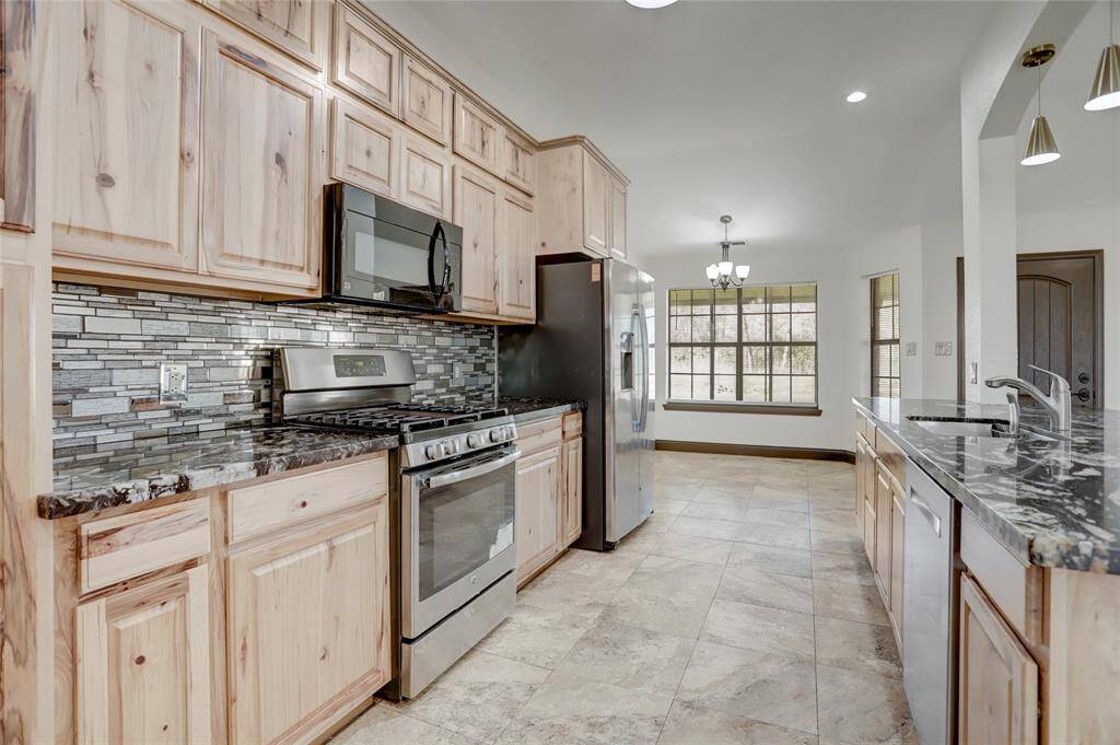 Tons of cabinets and counter space! Nice updated appliances!