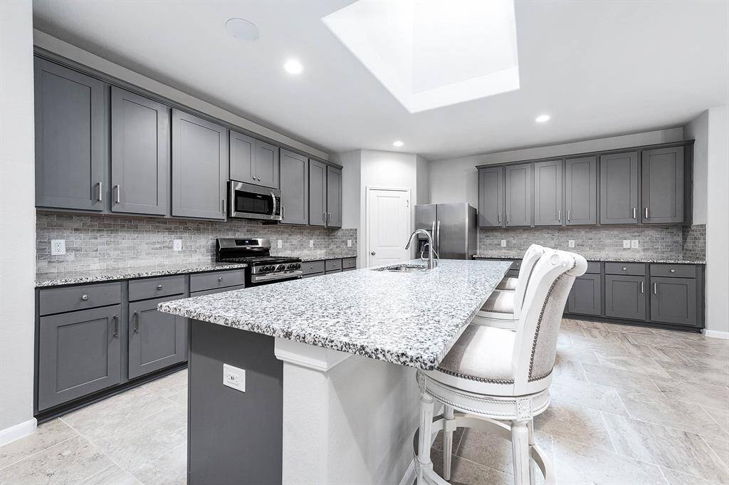 A sleek and modern cooking space.
