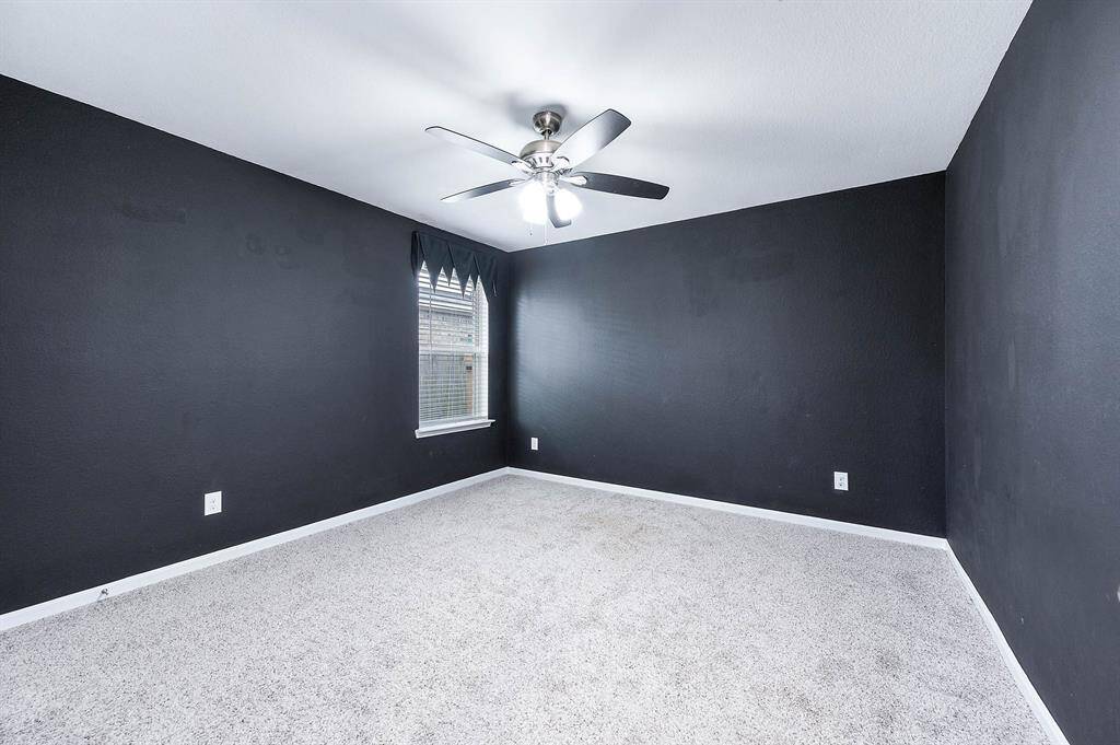 Spacious secondary bedroom with a walk in closet.
