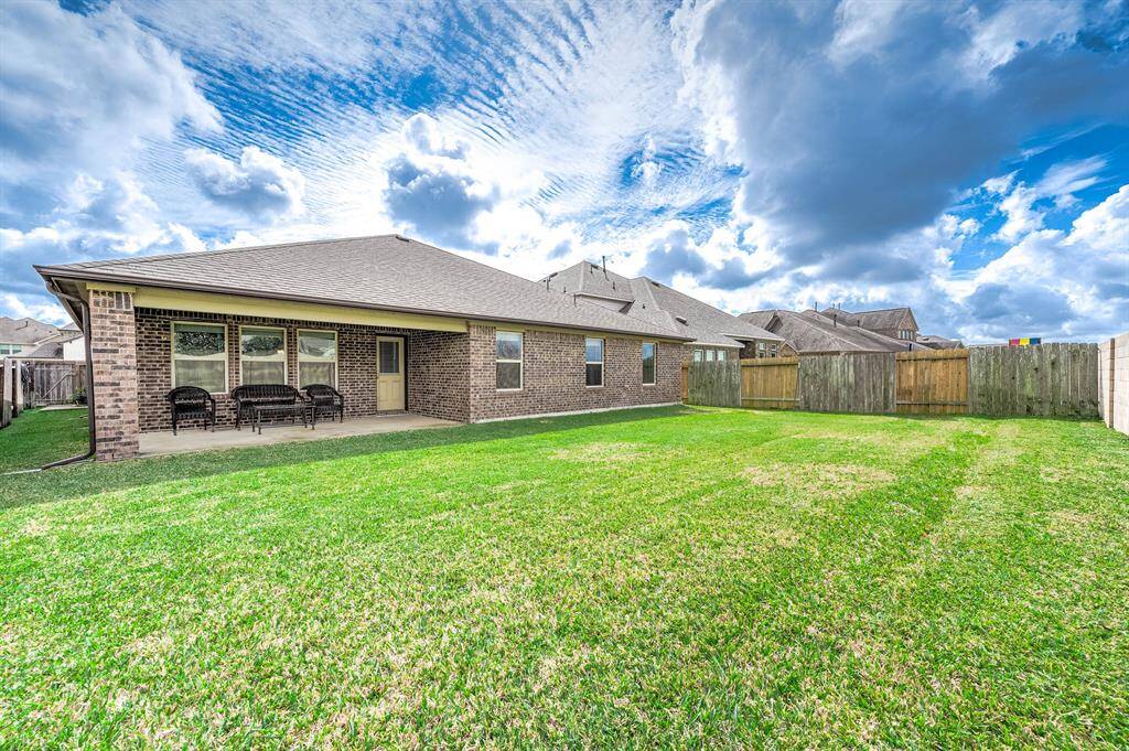 View of the spacious backyard.