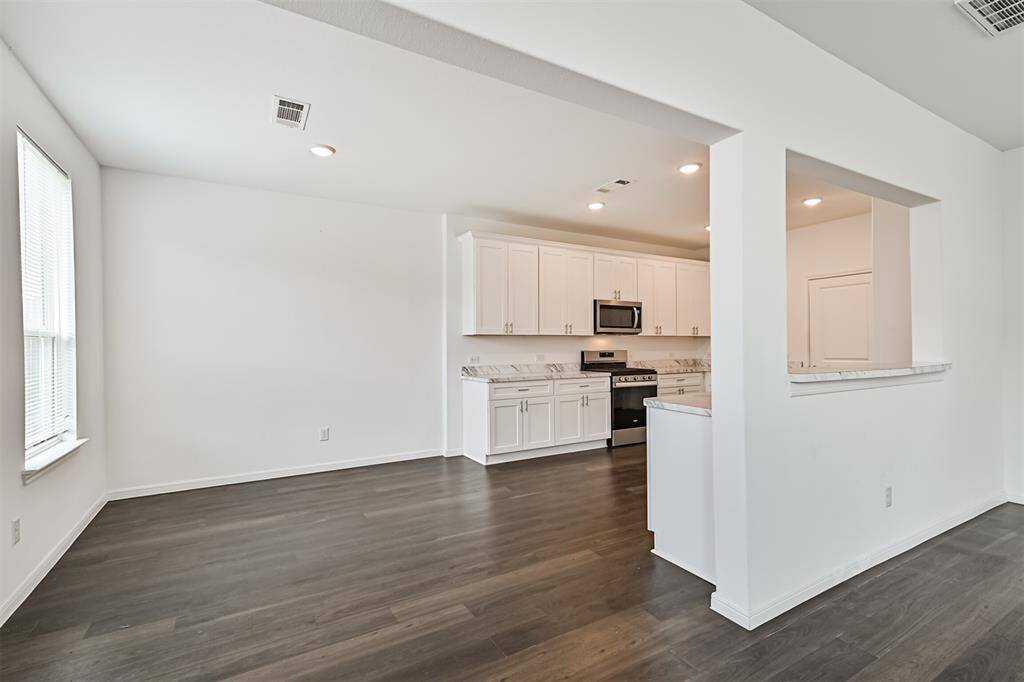 Dining area is open to family room and kitchen.