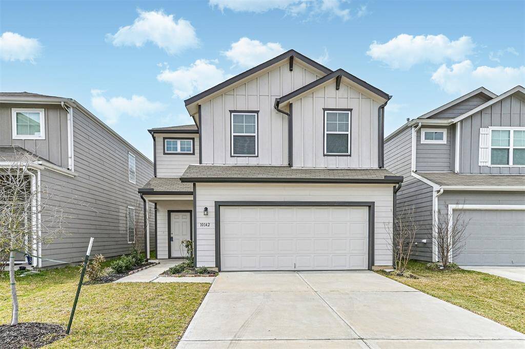 Spacious two-car garage for convenience and extra storage.