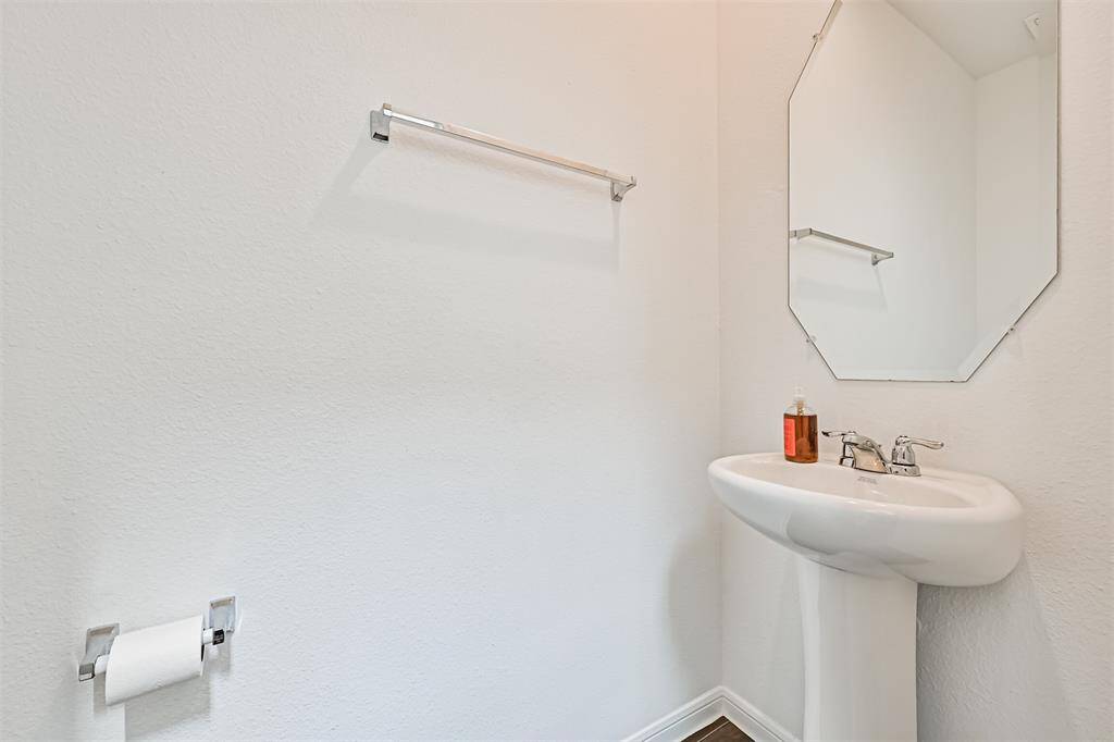 Chic and functional powder room, perfect for your guests.