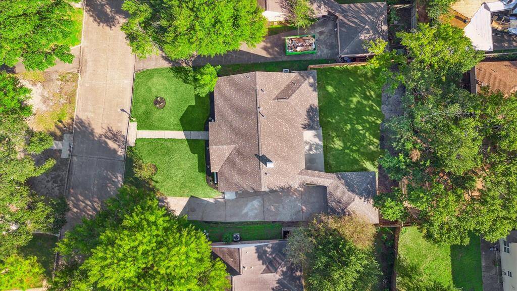 AN AERIAL PHOTO OF THE LOT SHOWCASING THE NEW SHINGLE ROOF (JULY 2024)!
