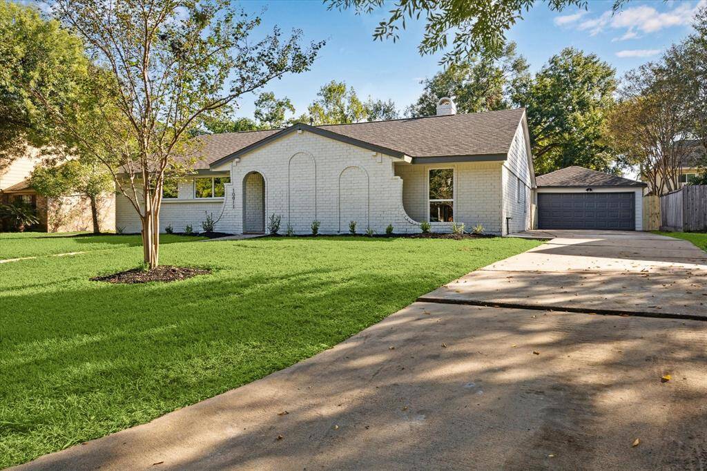 THE DRIVEWAY OFFERS AMPLE SPACE FOR GUEST AND VISITOR PARKING. THE SIDING ON THE GARAGE AND HOME HAS RECENTLY BEEN REPLACED.