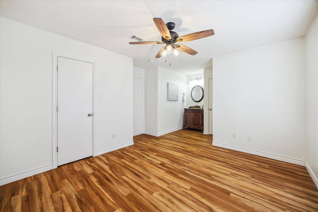 Primary bedroom, viewed from corner.