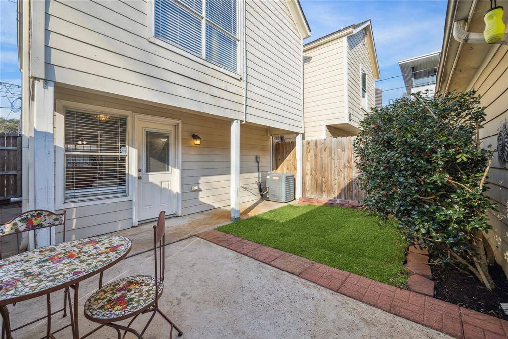 Great backyard with covered back patio.  Detached garage to the right.