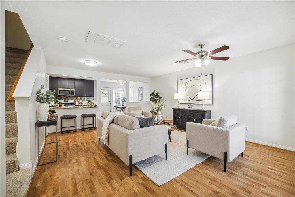 Spacious living room, with kitchen and breakfast area.