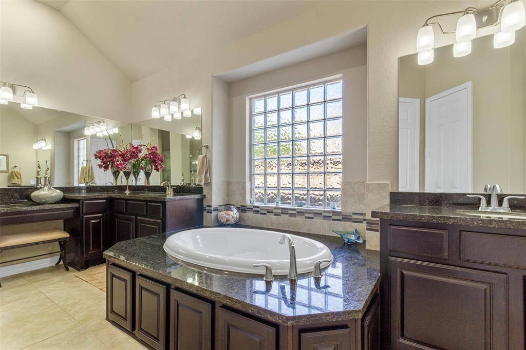 There is plenty of natural lighting and a vanity area.