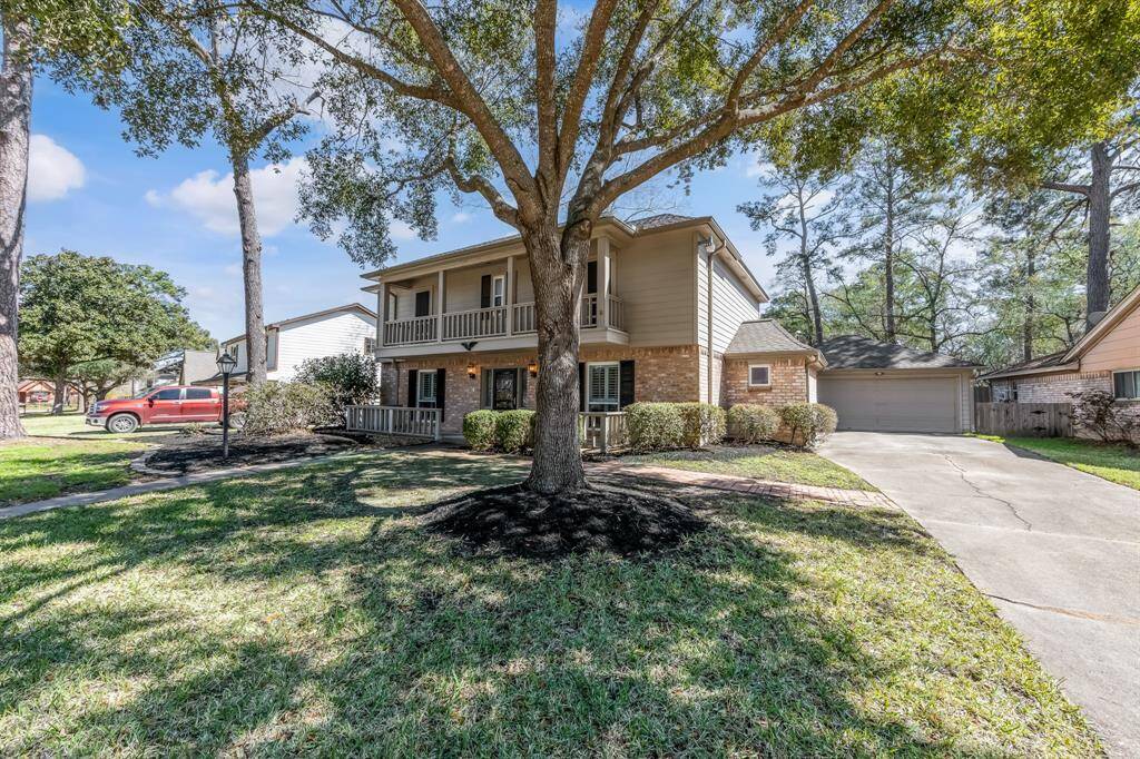 The property features a 2-car detached garage, offering ample space for vehicles and additional storage.