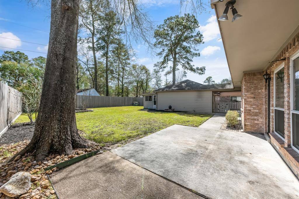 The backyard features a charming patio area, ideal for outdoor dining or relaxing, and offers plenty of open yard space to unleash your creativity and design the perfect outdoor oasis.