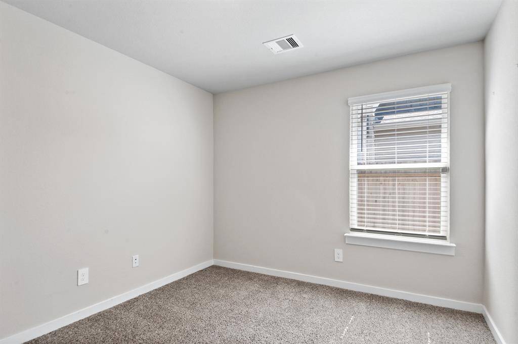 One of the secondary bedrooms located off of the main living space.