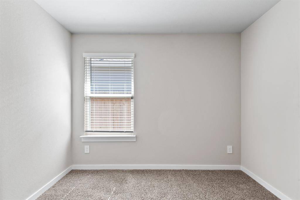 Another one of the secondary bedrooms