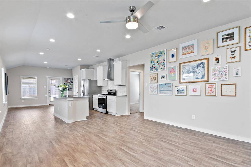 Lovely vinyl flooring throughout the main living spaces in the home.