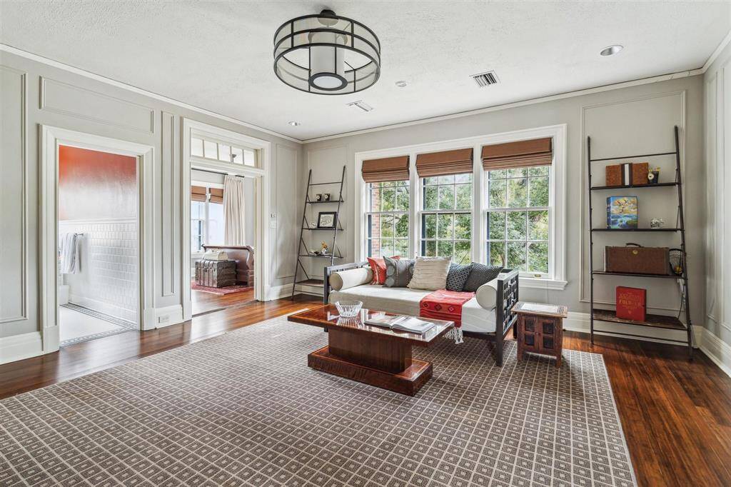 A rare luxury, this sitting room off bedroom 4 offers a bright and versatile space, perfect for lounging or a private retreat. Highlighting the home’s thoughtful design, three of the four bedrooms feature adjacent sitting rooms, providing unparalleled comfort and flexibility for daily living.