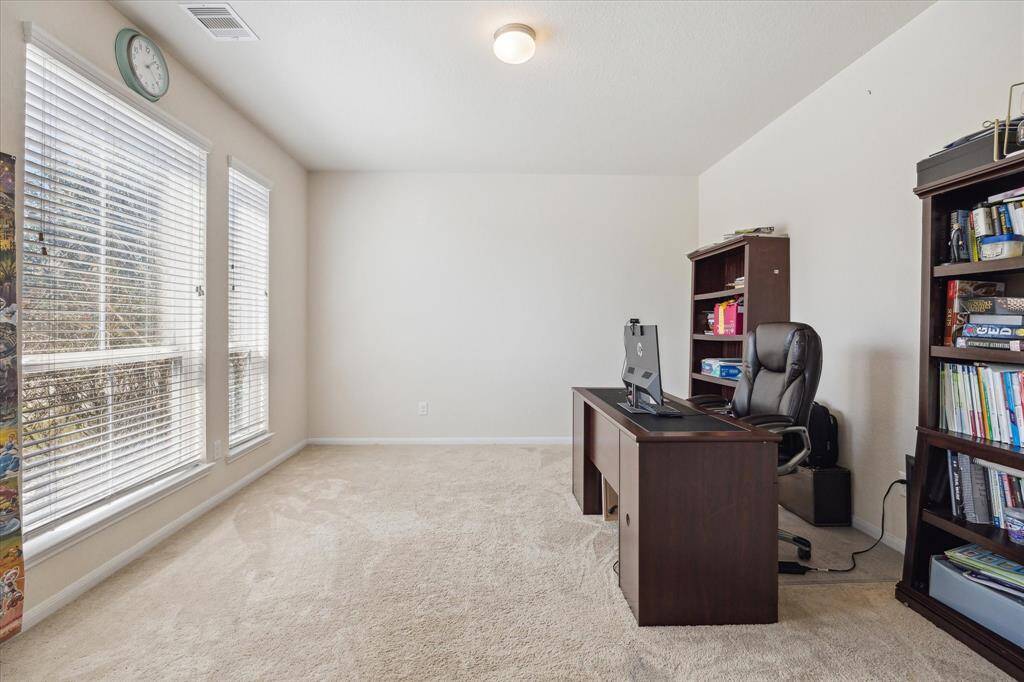 The office has French Doors and is bright and light.