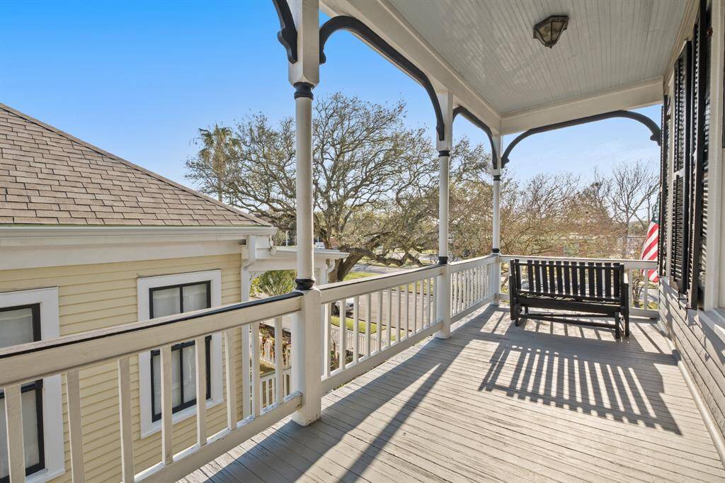 The second floor porch looking out onto 25th Street is the perfect place to watch the Mardi Gras parade roll by!