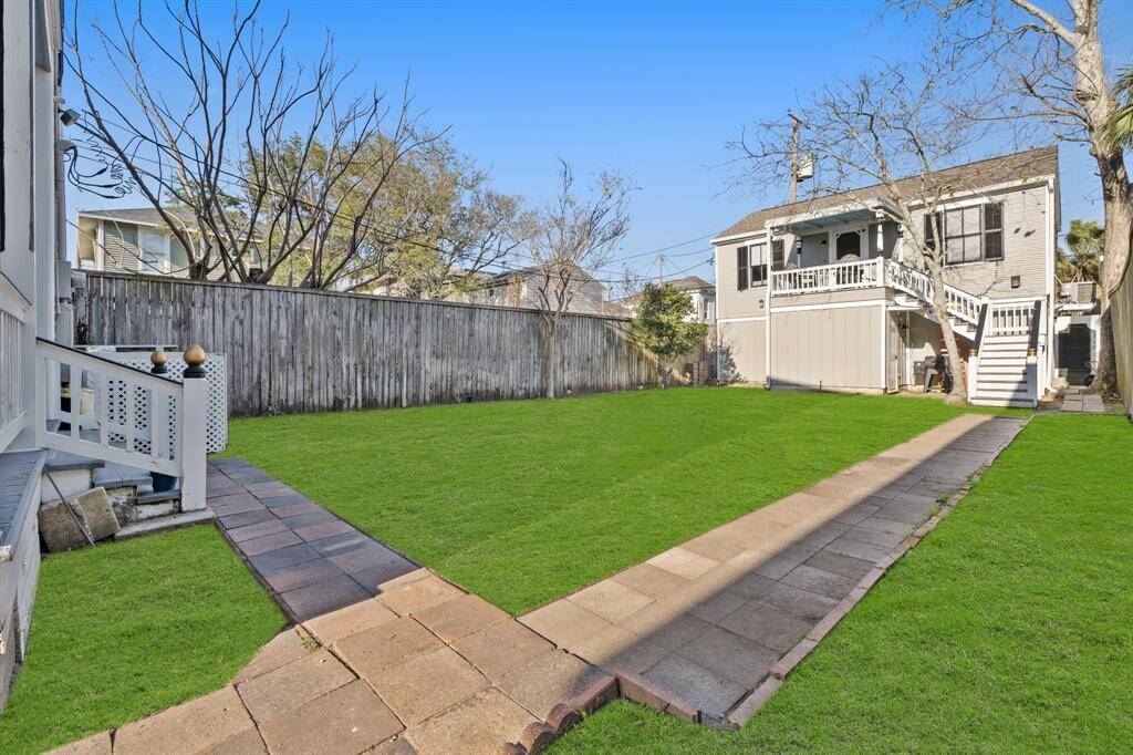 Large back yard with many possibilities!  This is the view from the back of the main home looking at the garage and apartment.