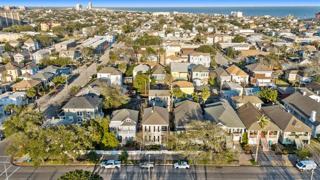 Aerial view of the street and home.