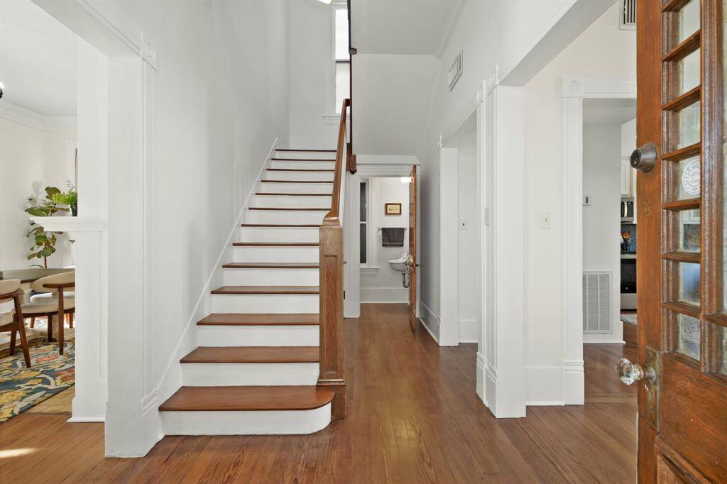 Large and open entry. The current owners have reconfigured the floorplan by taking down walls and opening up the first floor to create a more open flowing floodplan.
