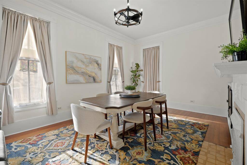 The dining room is located in the front of the house, facing the street.  The room is spacious enough to accommodate a large table or a table and sitting area.