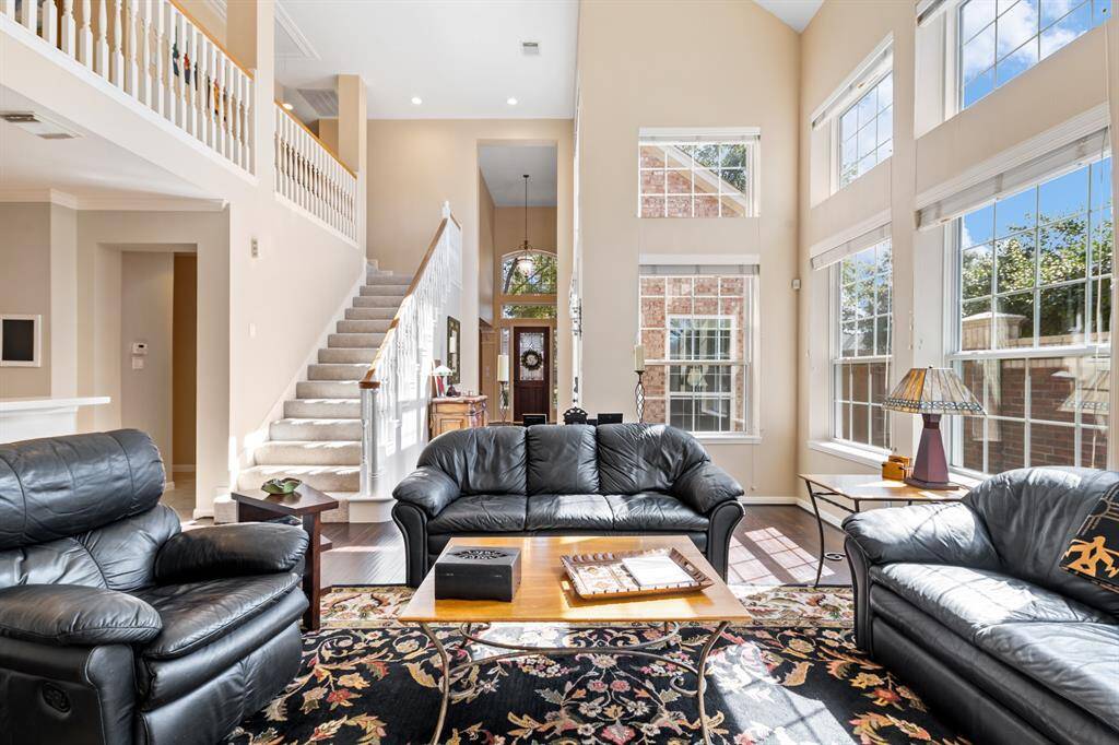The kitchen is just to the left in this picture. Visible are the stairs leading you to the two secondary bedrooms and the game room.