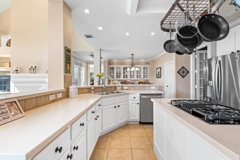 More storage space in these cabinets!  The French doors at the right side of the photo lead into the media room.