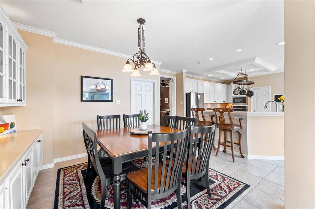 Your media room is just to the right of the white door (which leads to the laundry).