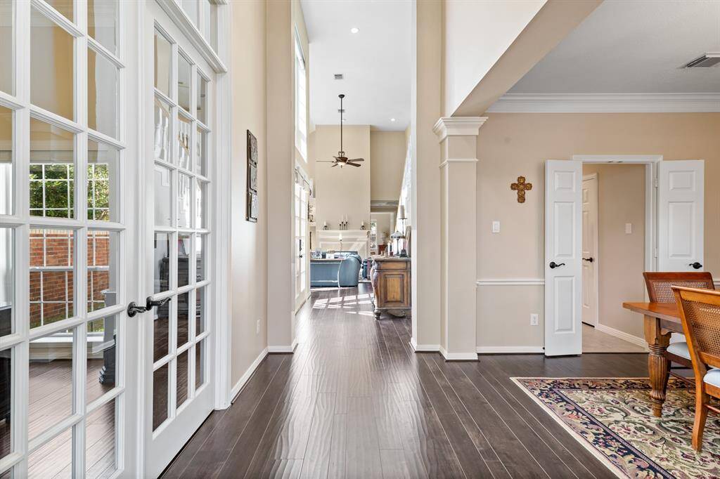 1514 Orchard Park Dr. is "The Inverness" plan built by Village Builders. Note the high ceilings, crown moldings, and the architectural accents.