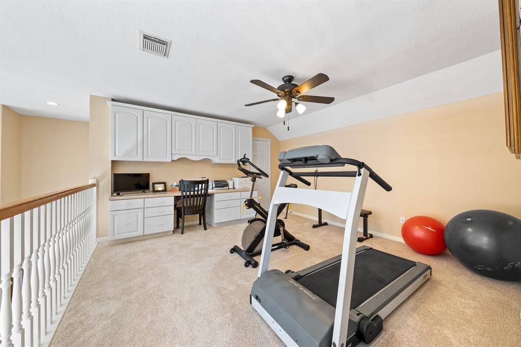 I have labeled it a game room, however, this space is so flexible, it can be an office, an exercise room, a hobby area - the possibilities are endless!