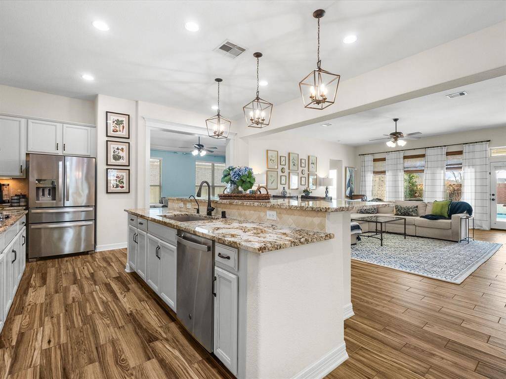 Massive kitchen island offers seating and open entertainment space!