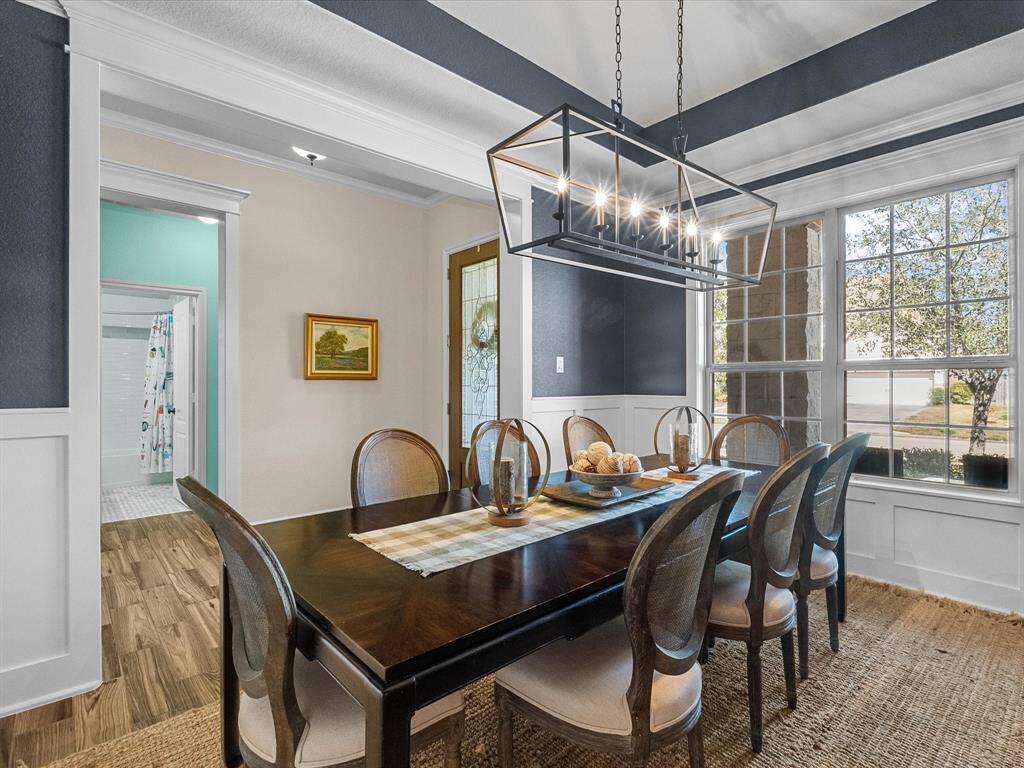 Formal dining room is a showcase for large table setting!